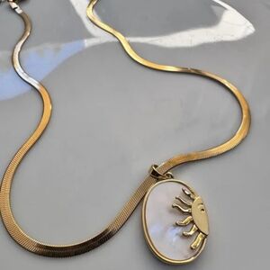 Elegant 18k Gold Plated Stainless Steel Necklace with Sun Pendant